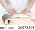 Chef Row of delicious sushi Maki roll  30572806
