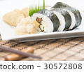 tasty sushi maki roll on plate with chopsticks 30572808