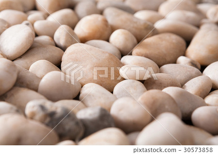 Sea pebbles background, natural seashore stones Sea pebbles background, natural seashore stones 30573858