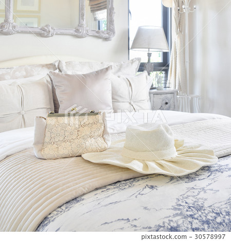 Decorative set on bed in luxury bedroom interior 30578997
