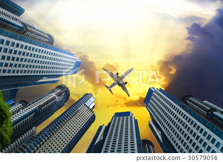Plane encircled by buildings 30579056