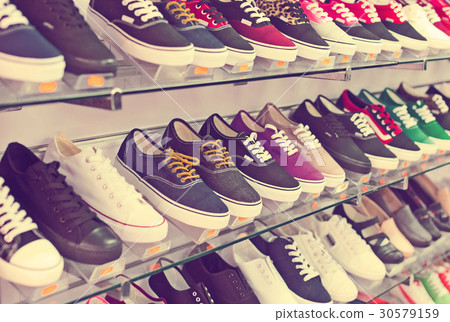Shelves with casual shoes Shelves with casual shoes 30579159