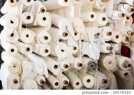 Fabric skeins in textile shop. Fabric skeins in textile shop. 30579183