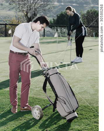 Man 30-36 years old is choosing right brassy 30580268