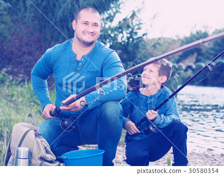 Little boy fishing Stock Photo