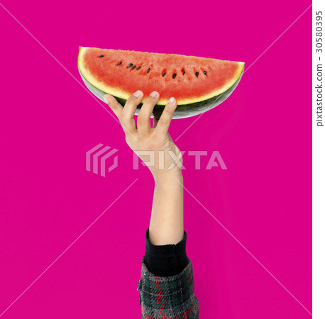 Hand Holding Watermelon Isolated Concept 30580395