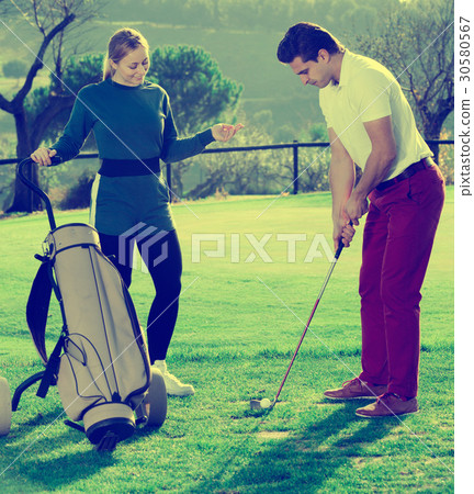 Golf partners playing together 30580567