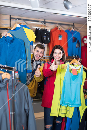 Couple boasting various sportswear items 30580997