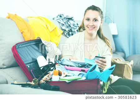 Woman getting ready for holidays 30581623