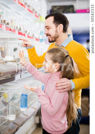 Father with daughter treated parrots and canaries Father with daughter treated parrots and canaries 30583333