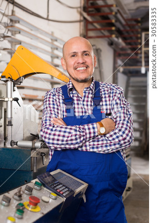 worker at professional lathe worker at professional lathe 30583335