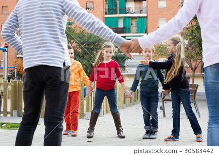 Preschool children playing forcing the city gates 30583442