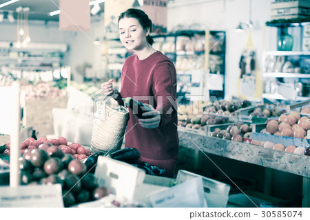 Customer looking eggplants 30585074