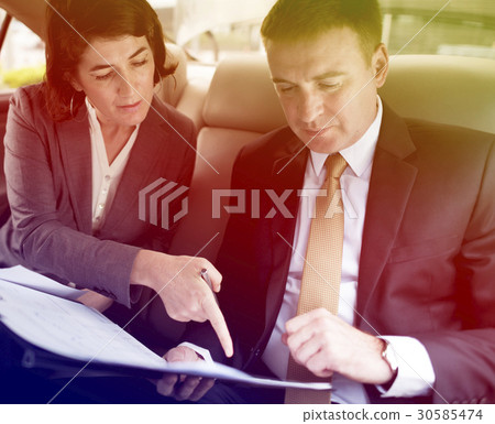 Business people meeting and discussion on backseat of the car Business people meeting and discussion on backseat of the car 30585474