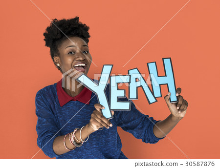 Smiling African Woman Holding Yeah Word Smiling African Woman Holding Yeah Word 30587876