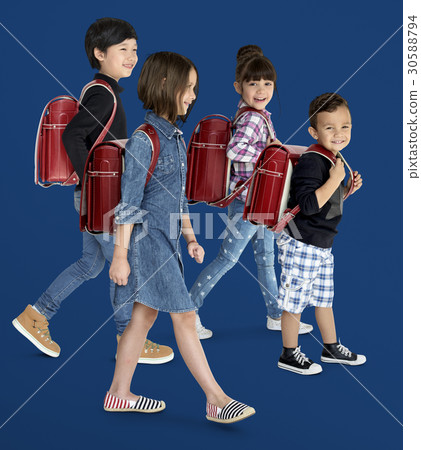 A group of children with a backpack A group of children with a backpack 30588794