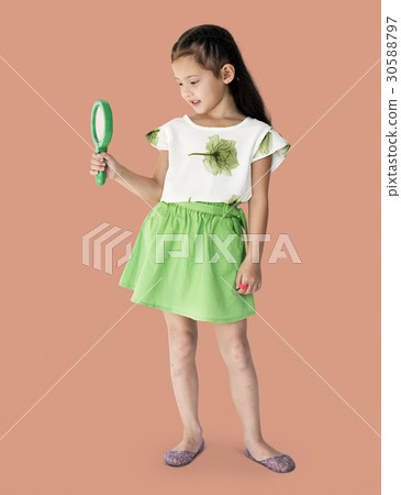A girl is holding green magnifier A girl is holding green magnifier 30588797