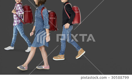 A group of children with a backpack A group of children with a backpack 30588799