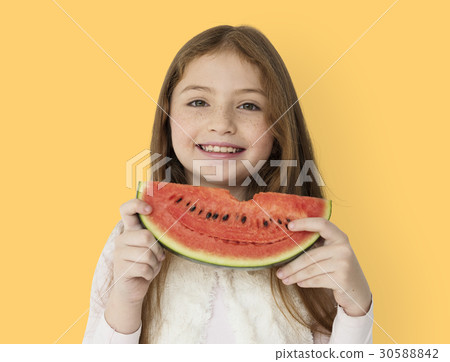 Young cheerful girl holding a slice of watermelon Young cheerful girl holding a slice of watermelon 30588842