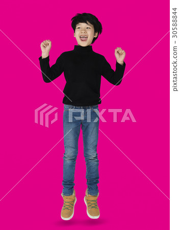 A happiness boy is jumping 30588844