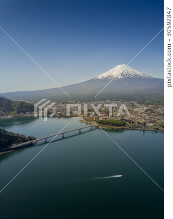 Mountain Fuji reflected in Kawaguchiko lake Mountain Fuji reflected in Kawaguchiko lake 30592847