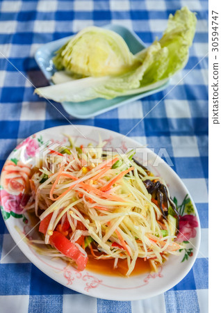 Spicy papaya salad with salted crab Spicy papaya salad with salted crab 30594747