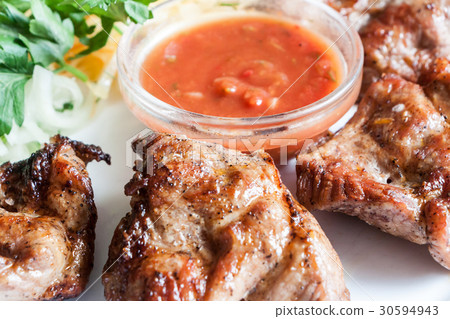 pork shish kebab with tomato sauce  30594943