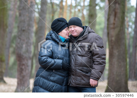 Old couple walking in the forest 30597446