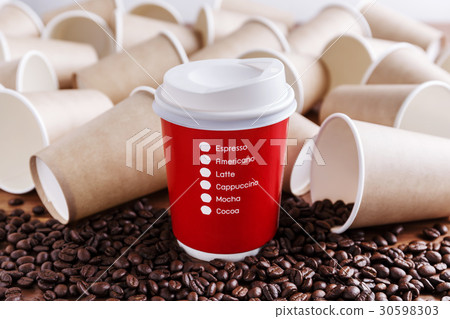 Red paper coffee cup with paper cups background Red paper coffee cup with paper cups background 30598303