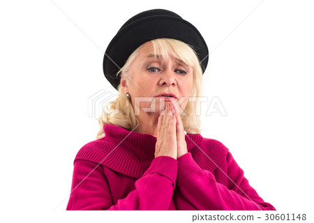 Senior lady praying isolated. Senior lady praying isolated. 30601148