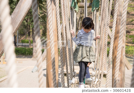 Girls playing in the park 30601428