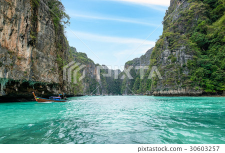 Long tail wooden boat on pileh lagoon 30603257