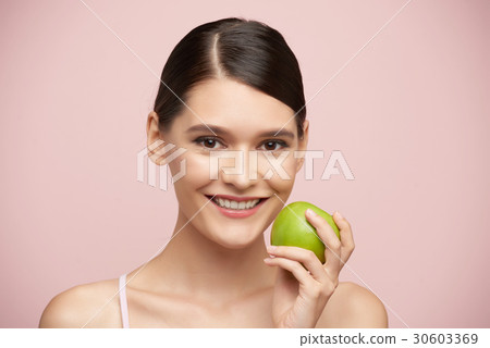 Eating apple 30603369