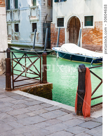 pier on rio del la pleta canal in Venice city pier on rio del la pleta canal in Venice city 30604688