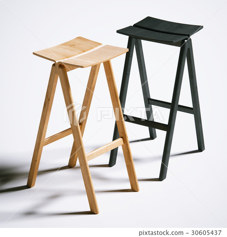 Wooden chairs with their shadows on the white. Wooden chairs with their shadows on the white. 30605437