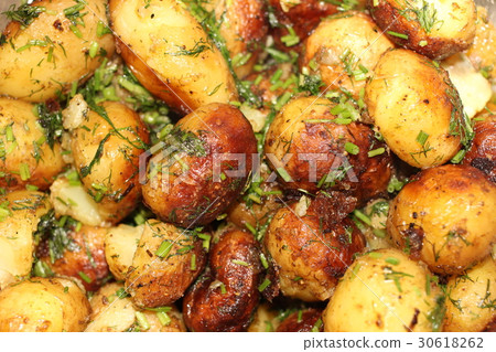 Fried young potatoes in oil with dill Fried young potatoes in oil with dill 30618262