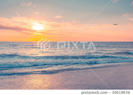 Waves at sunset on a warm evening Waves at sunset on a warm evening 30619639