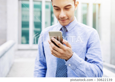 Blurred Businessman use Smart phone,Depth of field Blurred Businessman use Smart phone,Depth of field 30622139