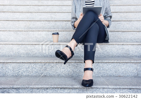 Business working woman sit using digital tablet Business working woman sit using digital tablet 30622142