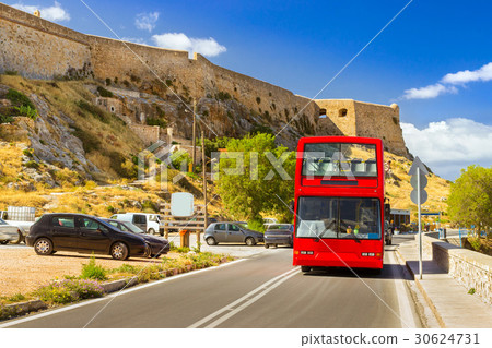 Red double-Decker sightseeing bus, Rethymno, Crete 30624731