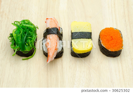 Sushi on wooden plate 30625302