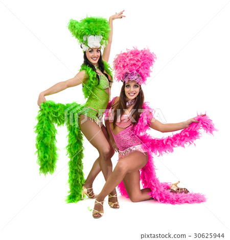 two carnival dancer women dancing against isolated two carnival dancer women dancing against isolated 30625944