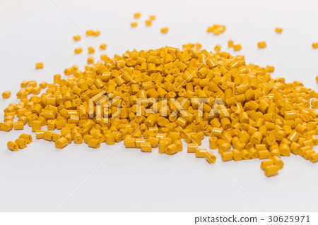 Plastic pellets yellow on white background. Plastic pellets yellow on white background. 30625971