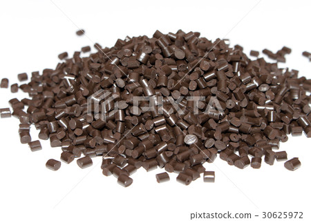 Plastic pellets brown on white background. Plastic pellets brown on white background. 30625972