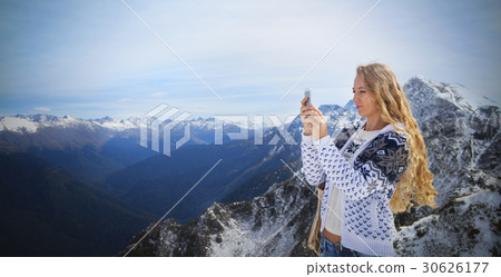 Woman making photo winter landscape mountains Woman making photo winter landscape mountains 30626177