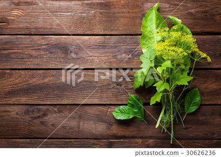 Herbs and spices on wooden culinary background Herbs and spices on wooden culinary background 30626236