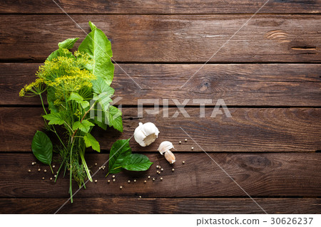 Herbs and spices on wooden culinary background Herbs and spices on wooden culinary background 30626237