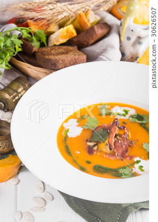pumpkin soup with bacon in a rustic style on the pumpkin soup with bacon in a rustic style on the 30626507