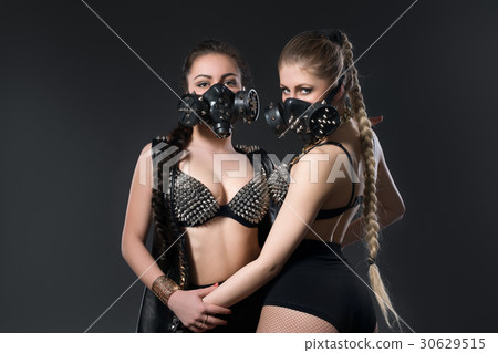 Bdsm couple in leather lingerie and fetish mask  30629515