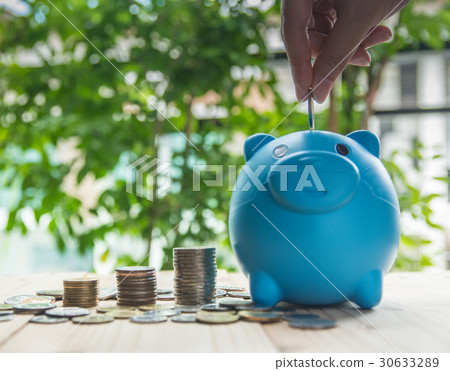 piggy bank with money coins in saving money . 30633289